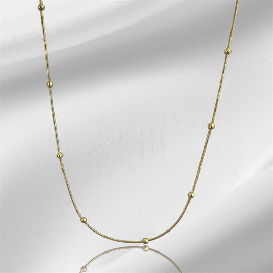 CADENA DE BALINES 18K